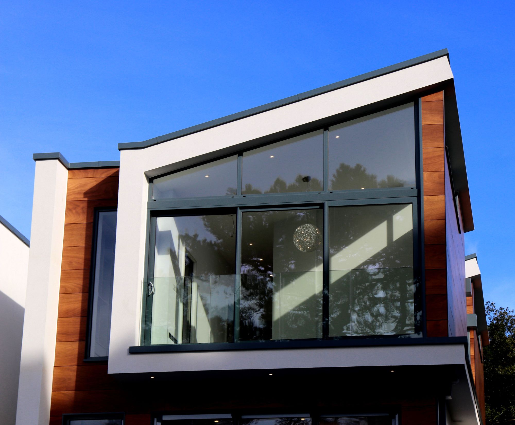 Contemporary house with large windows and architectural glazing